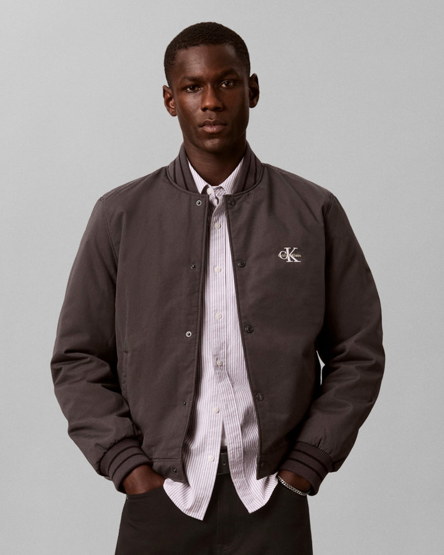 LS NYLON MIXED MEDIA VARSITY